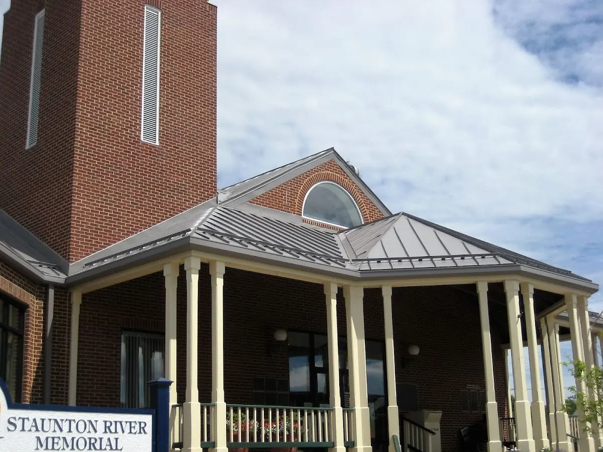 Skilled roofing craftsmen working on a residential roof in Blairsville